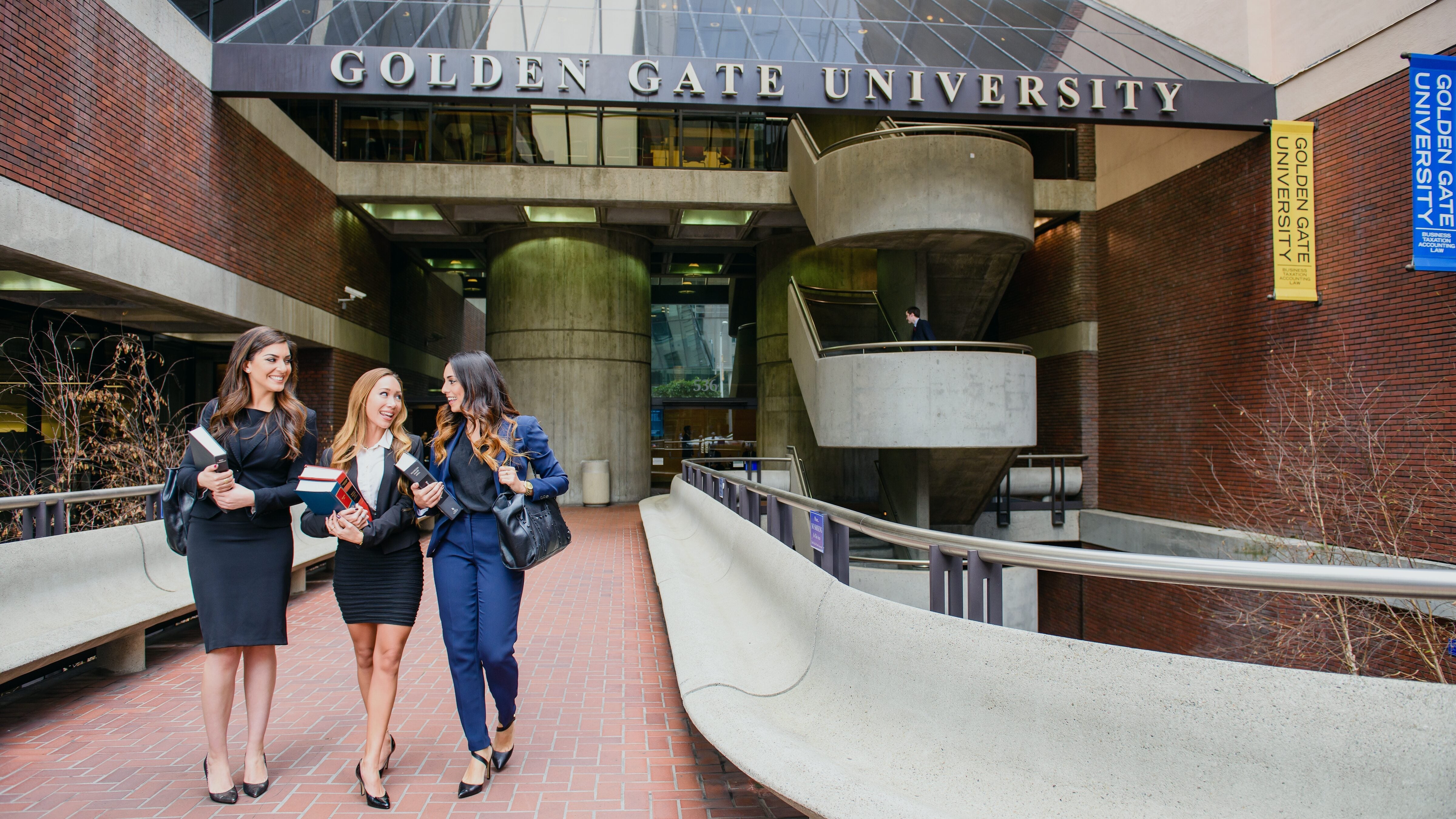 Students walking out the Golden Gate University building.